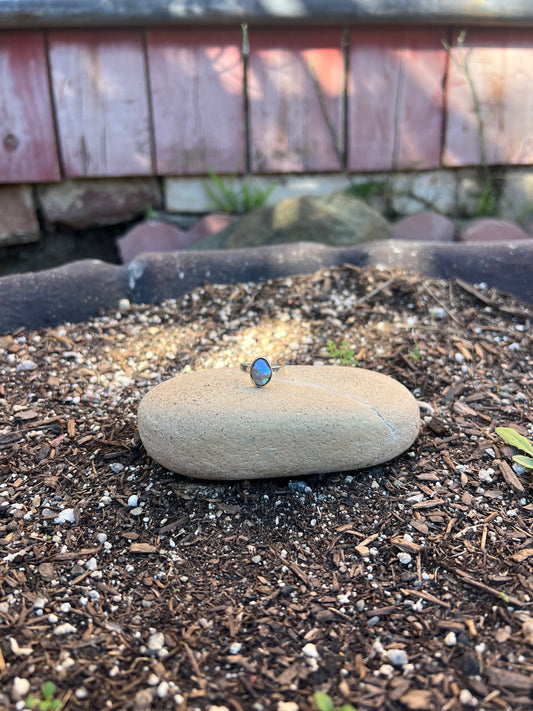 Dainty Iridescent Baroque Pearl Ring  purple on rock