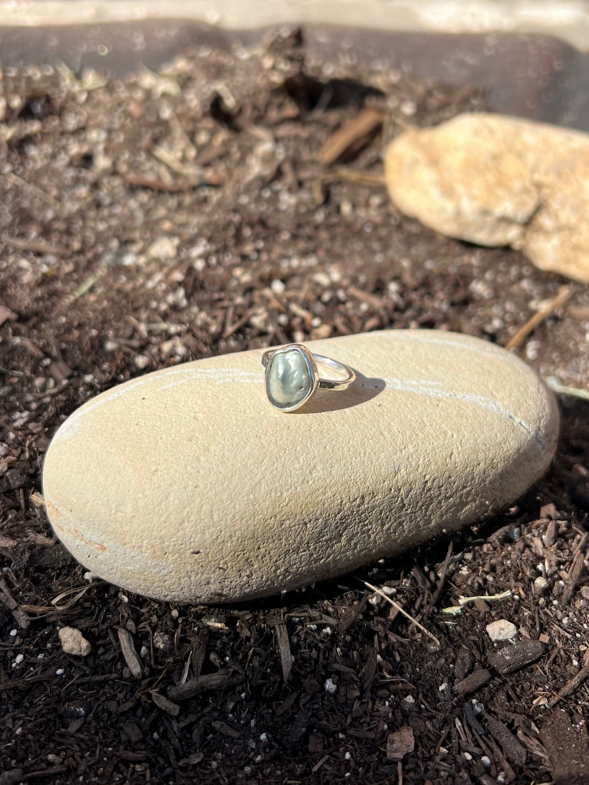 Ring on a rock in a garden setting