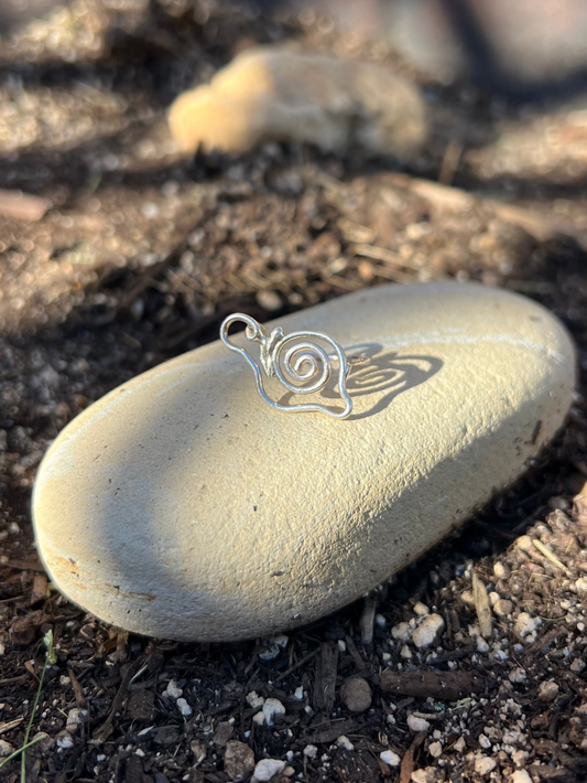 snail sterling silver ring on a stone