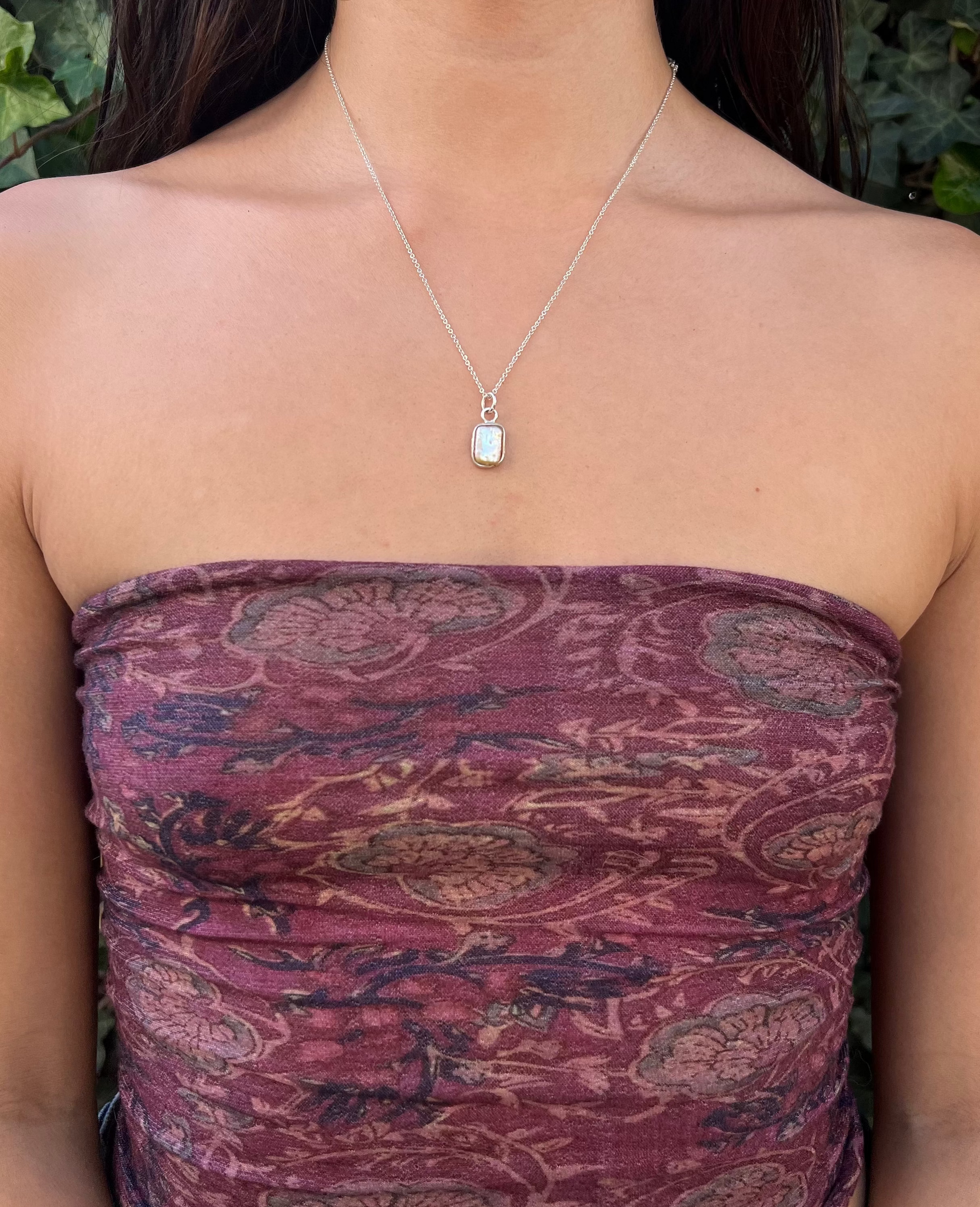 pink pearl necklace modeled