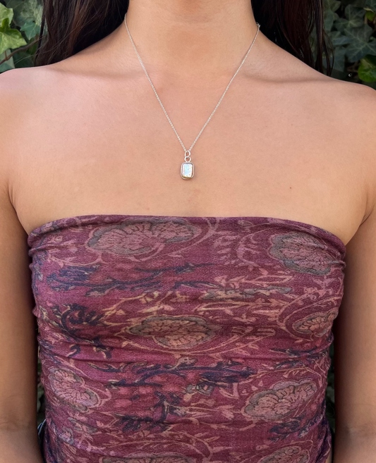 pink pearl necklace modeled